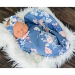 Wickeltuch und Stirnband mit Blumenmuster für Babys